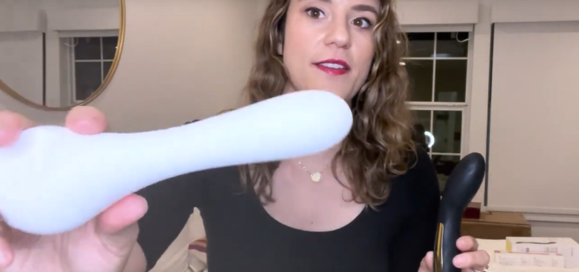 afterglow CEO Lilly Sparks holds up the Whoop·de·doo vibrator