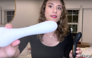 afterglow CEO Lilly Sparks holds up the Whoop·de·doo vibrator