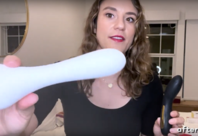 afterglow CEO Lilly Sparks holds up the Whoop·de·doo vibrator