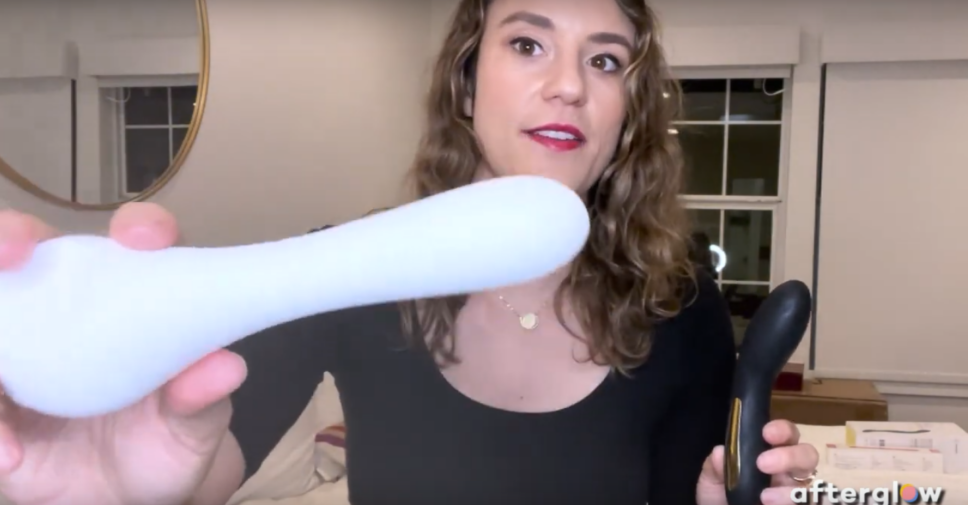 afterglow CEO Lilly Sparks holds up the Whoop·de·doo vibrator