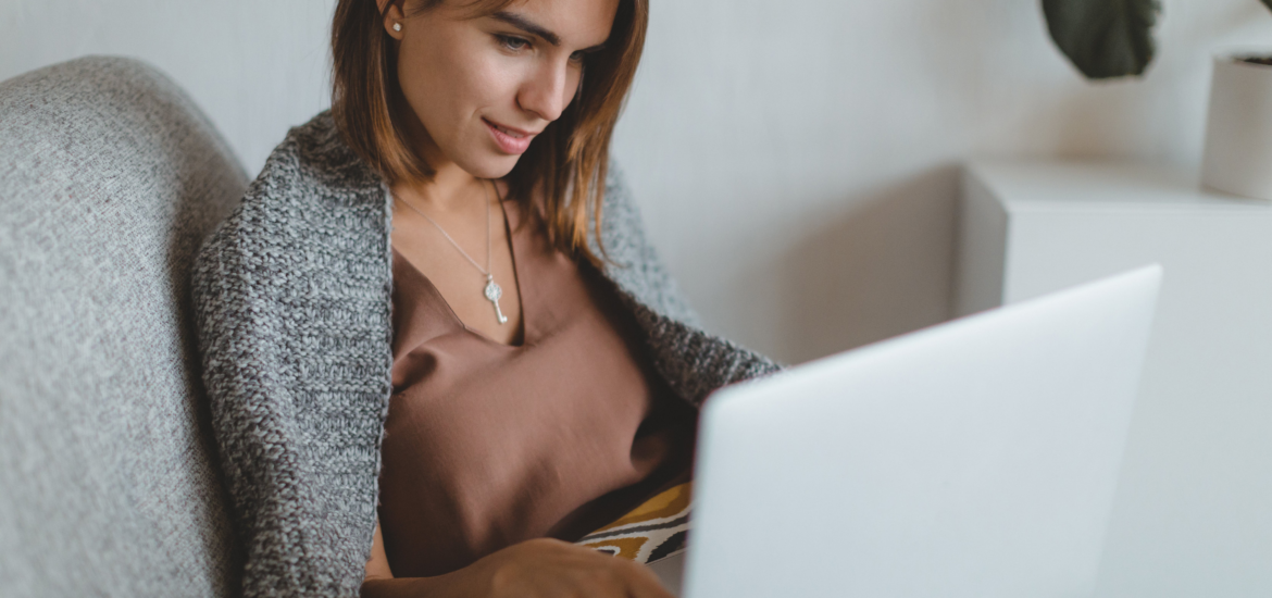 woman in bed on laptop