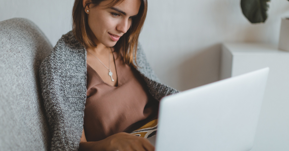 woman in bed on laptop